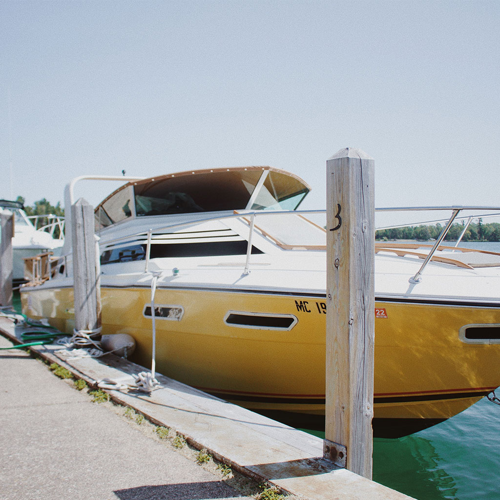 West End Boatworks boat tied to dock services